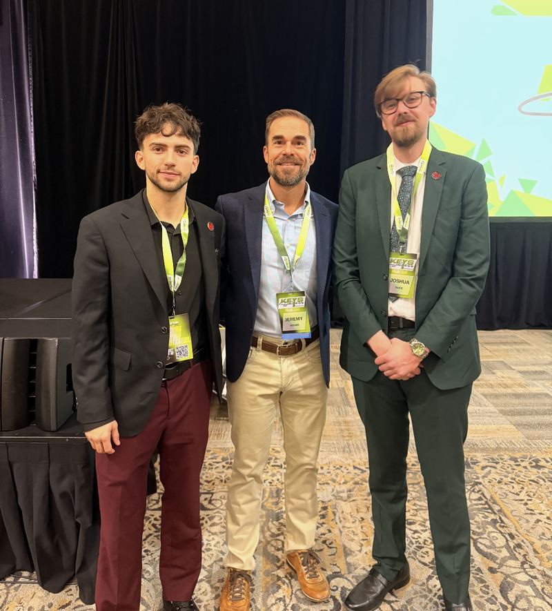 LY Marketing team members networking at a sales conference