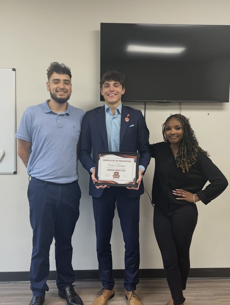 LY Marketing team members celebrating a promotion